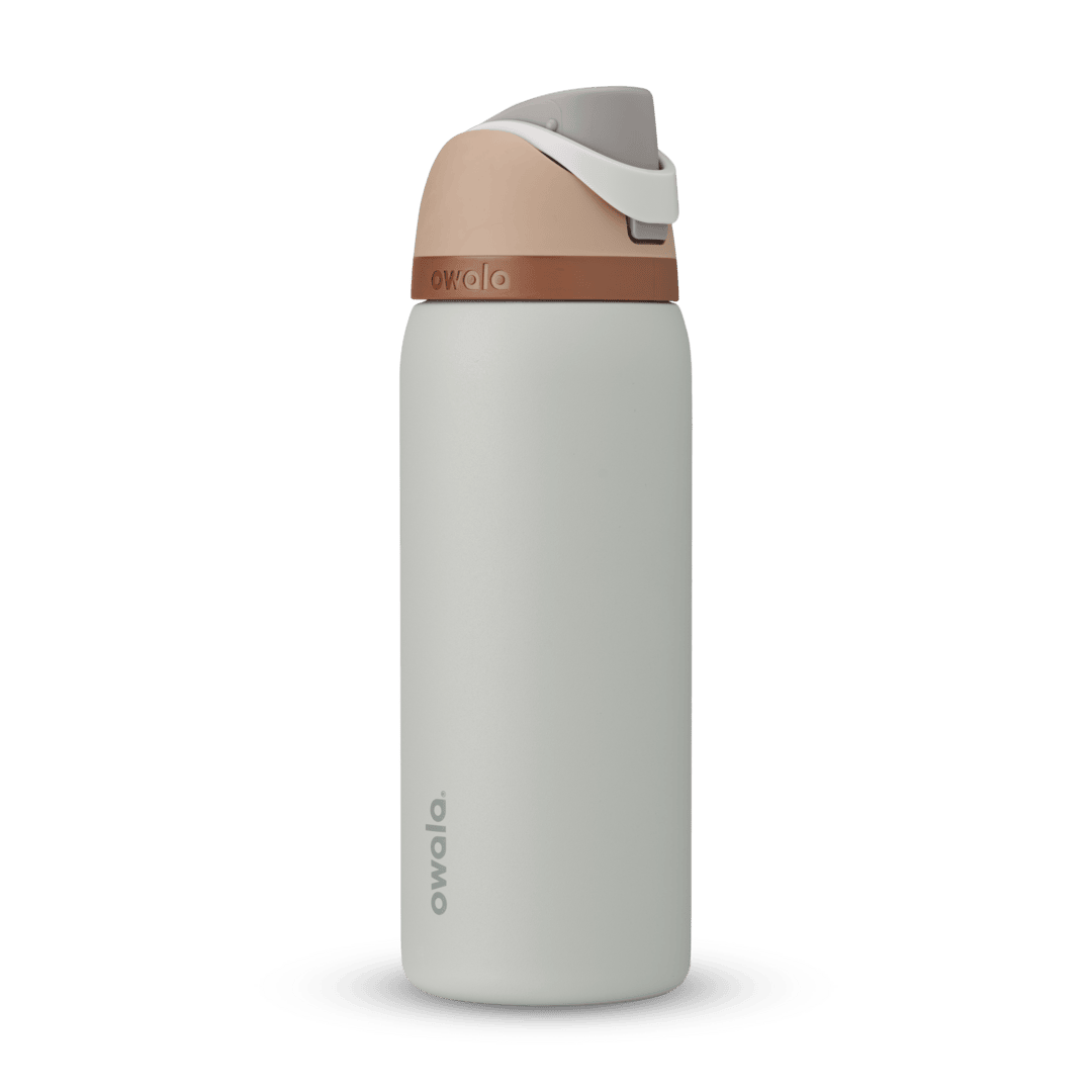 Full profile shot of the 32oz 'Calm Waters' FreeSip water bottle, highlighting its soothing blue-grey and tan color design.